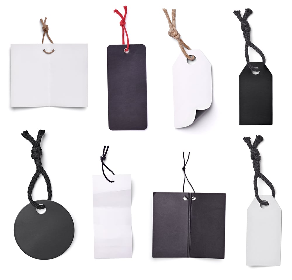 collection of blank price labels on white background. each one is shot separately